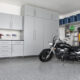 garage cabinets and a parked motorcycle